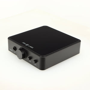 Front right corner of a used JDS Labs Atom Headphone Amplifier in a black finish