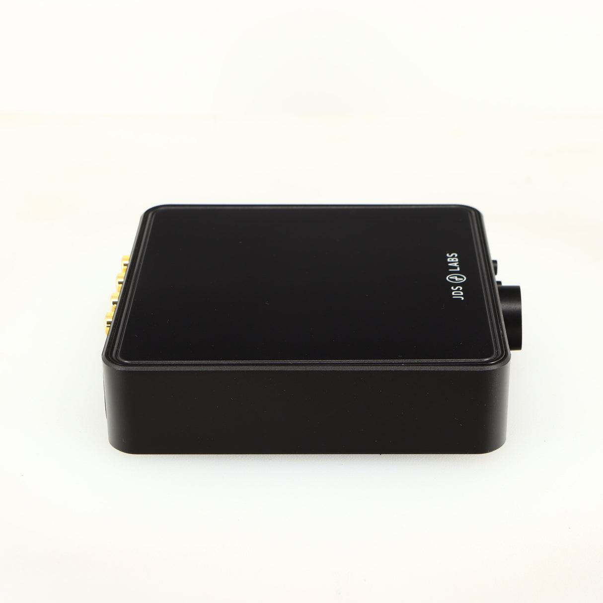 Left side view of a used JDS Labs Atom Headphone Amplifier in a black finish
