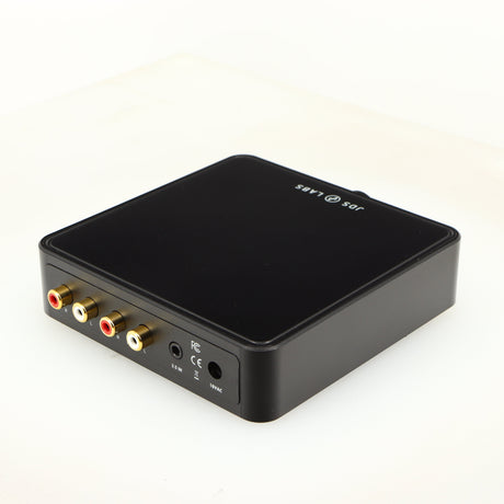 Rear left corner of a used JDS Labs Atom Headphone Amplifier in a black finish