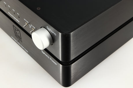 Close up of a used Keces Sphono Phonostage in a black finish showing small chip on front right corner