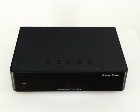 Top of a used Keces Sphono Power Supply in a black finish