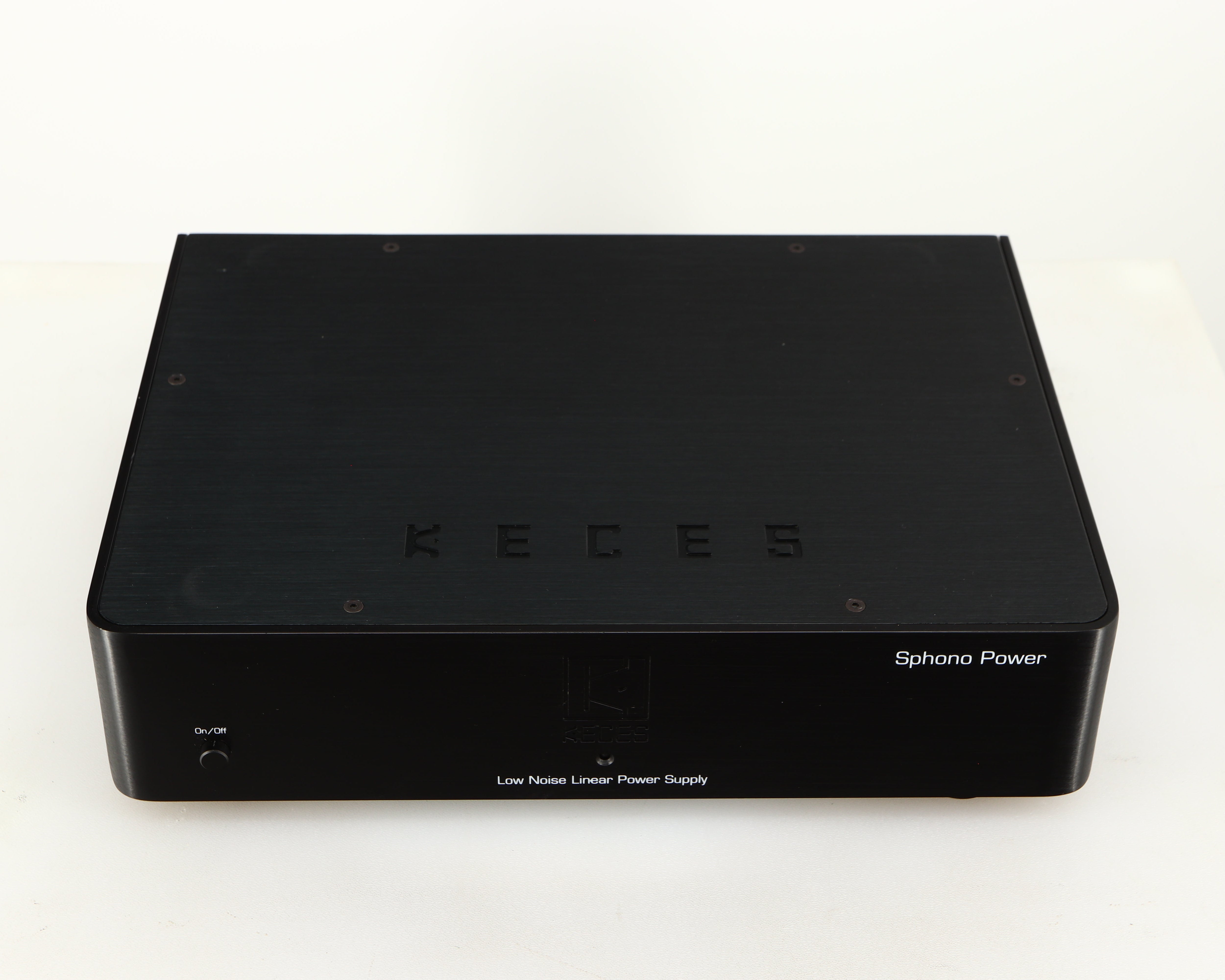 Top of a used Keces Sphono Power Supply in a black finish
