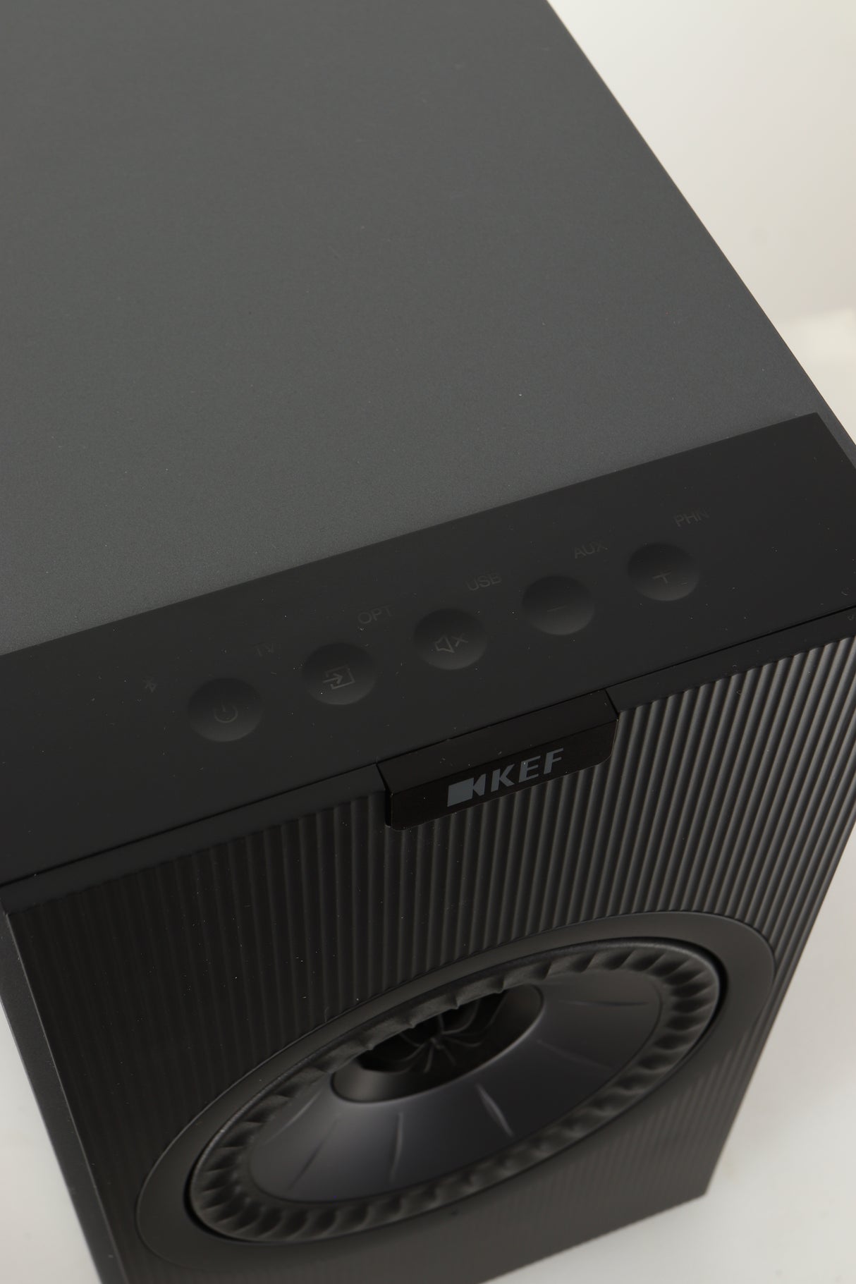 Close up view of a used KEF Coda W Active Standmount Speaker in Dark Titanium finish