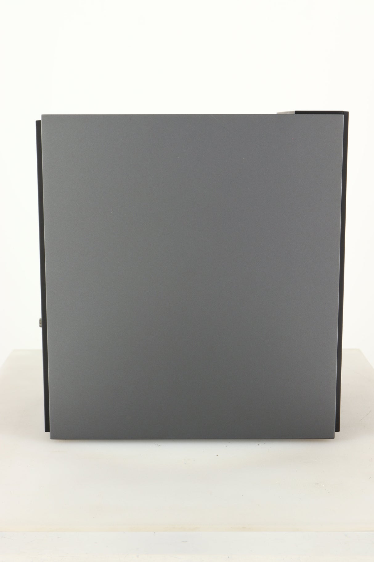 Side view of a used KEF Coda W Active Standmount Speaker in Dark Titanium finish