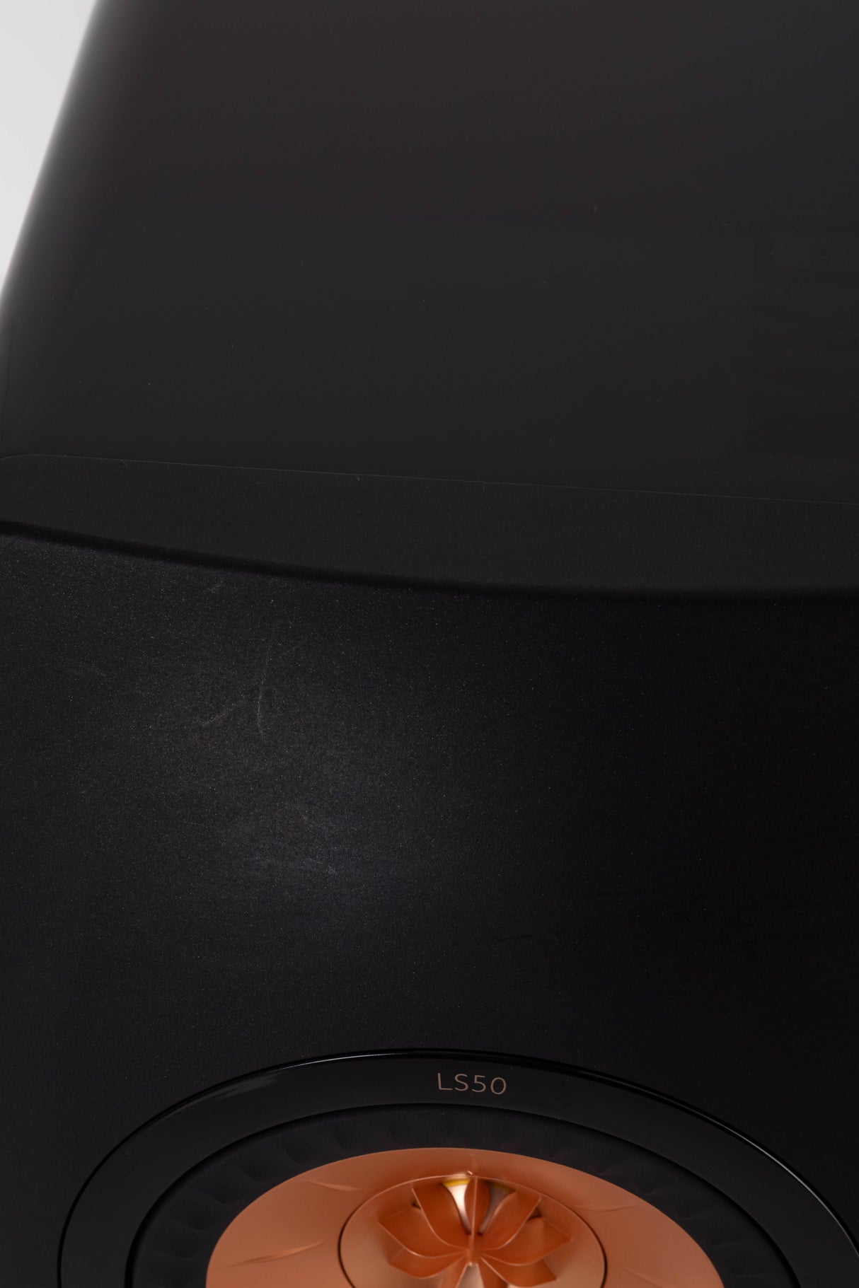 Close up view of a used KEF LS50 Standmount Speaker in Gloss Black
