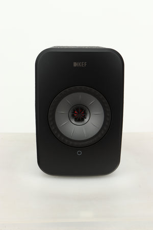 Front view of a KEF LSX Wireless Standmount Speaker in Black finish