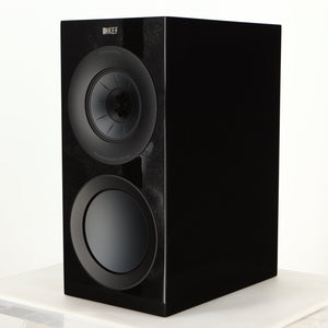 Front right corner of a used KEF R3 Meta Standmount Speaker in a black gloss finish