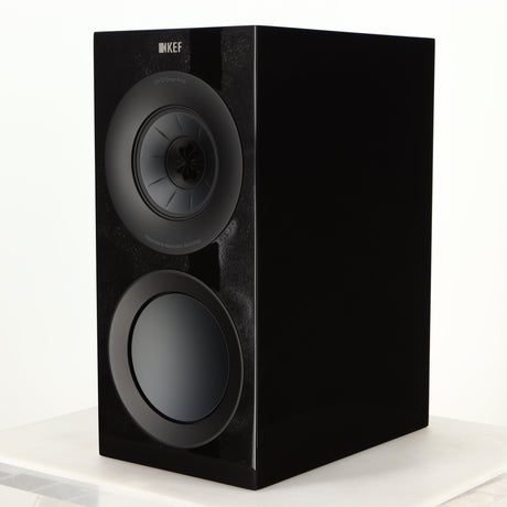 Front right corner of a used KEF R3 Meta Standmount Speaker in a black gloss finish