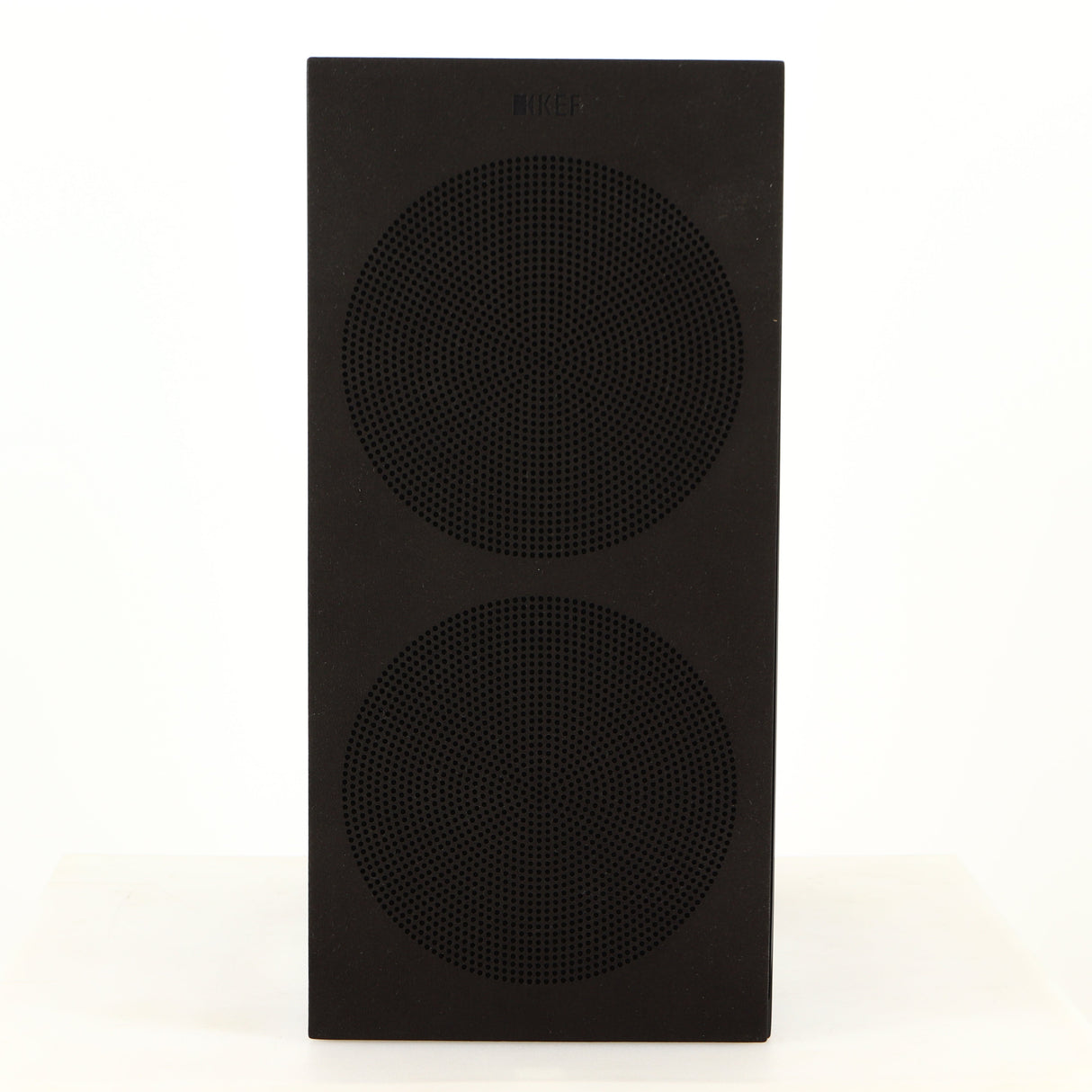Front view of a used KEF R3 Meta Standmount Speaker in a black gloss finish showing grille