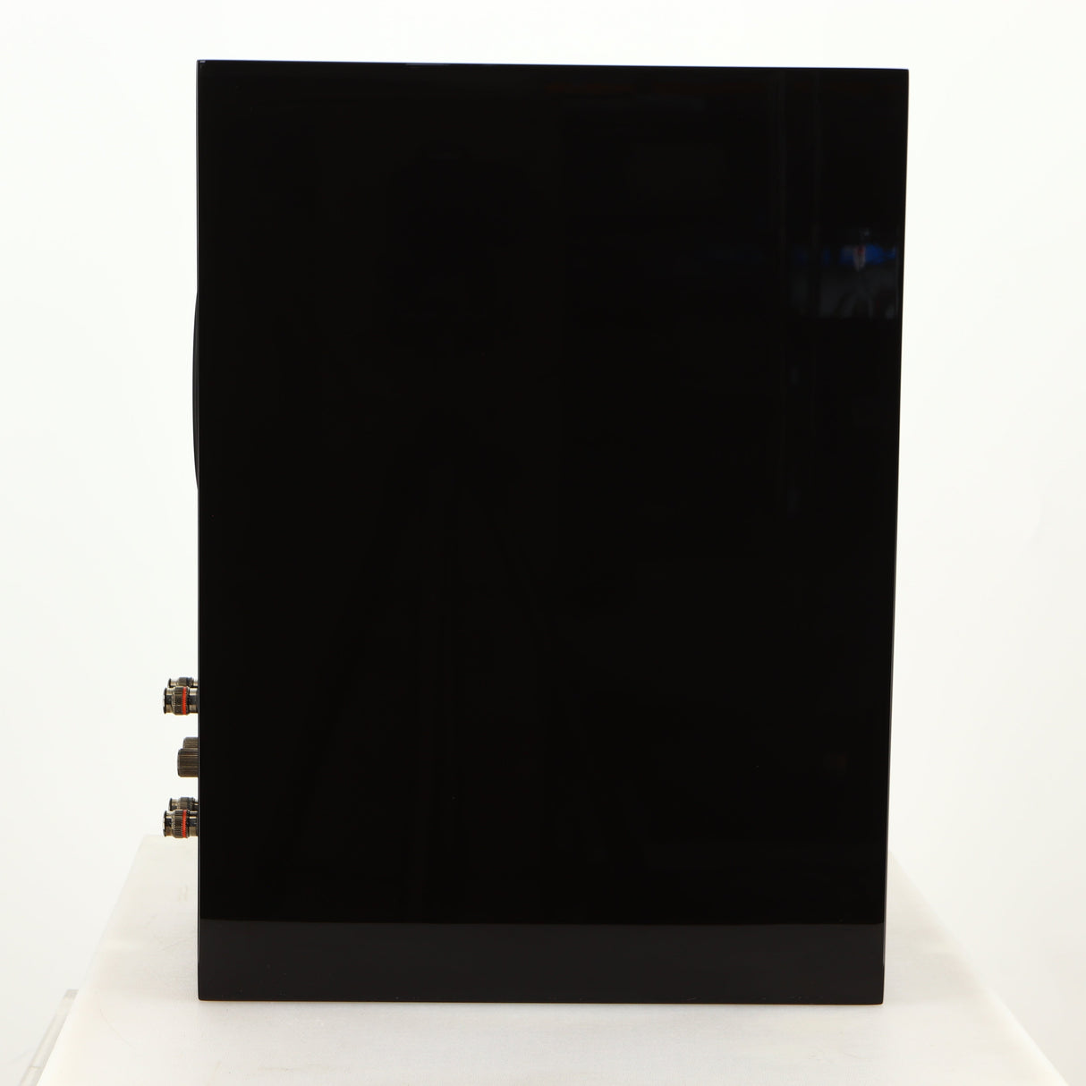 Left side of a used KEF R3 Meta Standmount Speaker in a black gloss finish