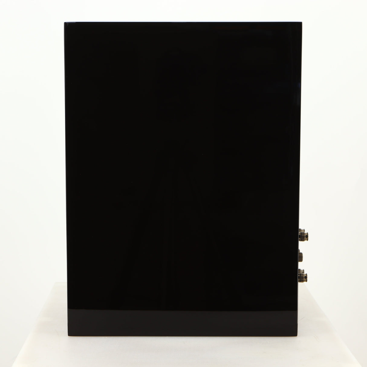 Right side of a used KEF R3 Meta Standmount Speaker in a black gloss finish