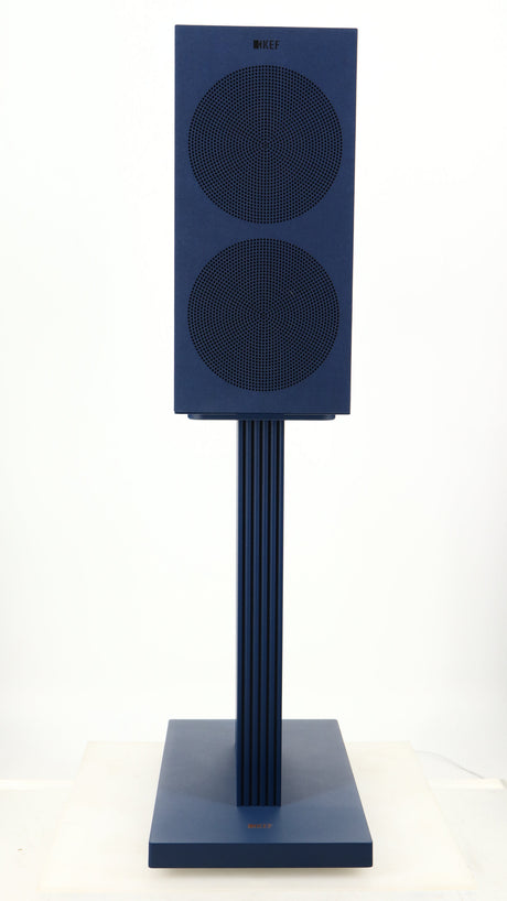 Front view of a used KEF R3 META Standmount Speaker W/ Stand in an indigo gloss finish showing grille