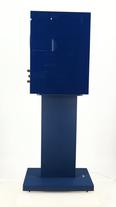 Left side view of a used KEF R3 META Standmount Speaker W/ Stand in an indigo gloss finish