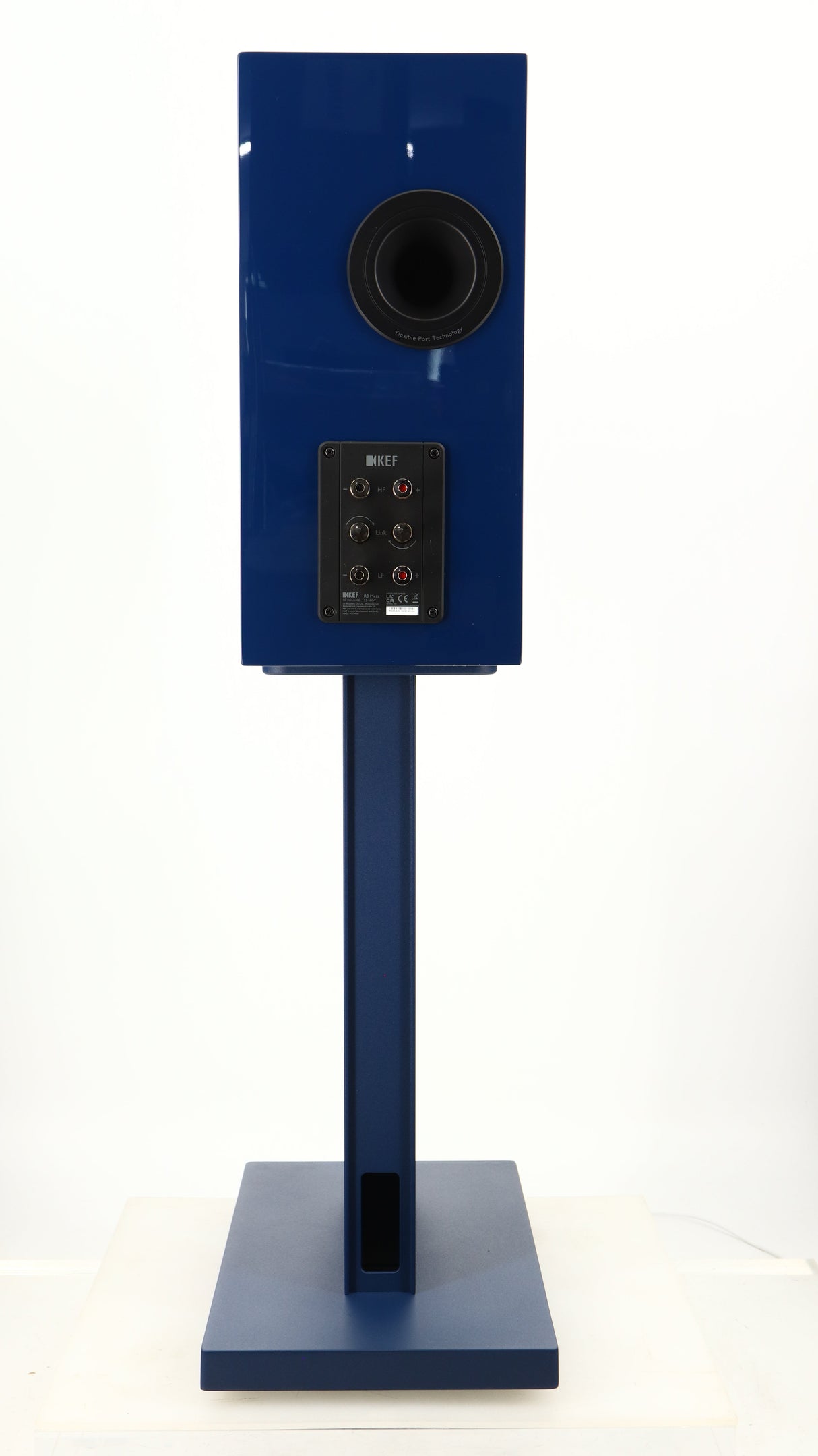 Rear view of a used KEF R3 META Standmount Speaker W/ Stand in an indigo gloss finish