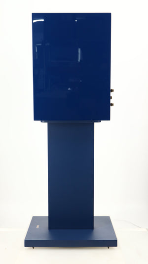 Right side view of a used KEF R3 META Standmount Speaker W/ Stand in an indigo gloss finish