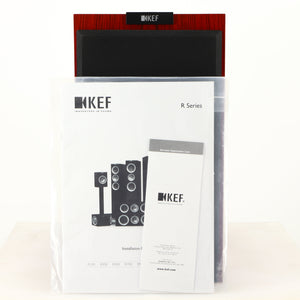 Front view of a used KEF R300 Standmount Speaker in a rosewood finish showing Manual and Warranty Registration Card