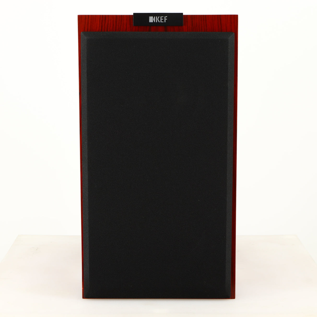 Front view of a used KEF R300 Standmount Speaker in a rosewood finish showing Grille