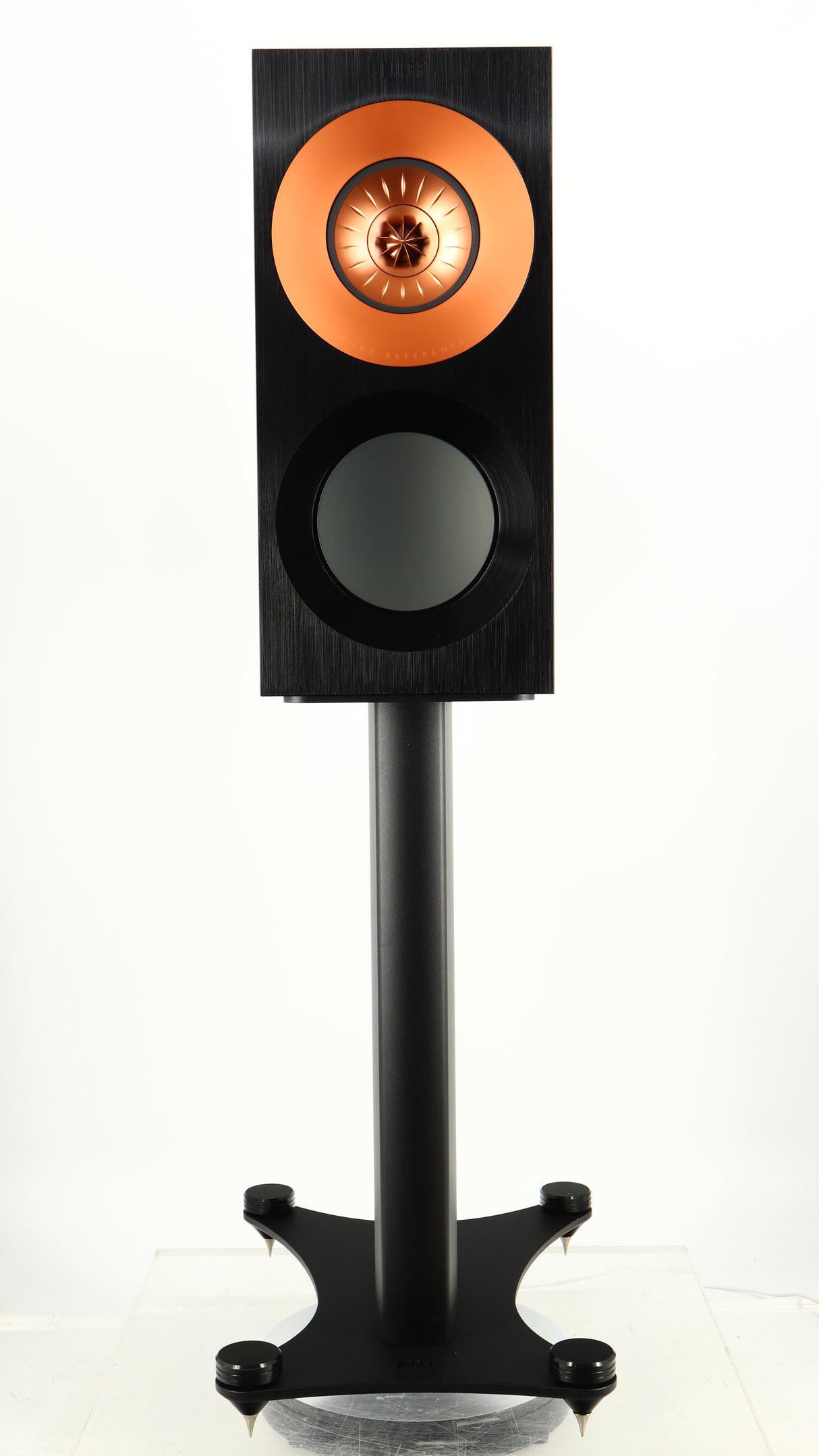 Front view of a used KEF Reference 1 Standmount Speaker W/ Stand in a copper black aluminium finish