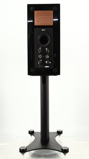 Rear view of a used KEF Reference 1 Standmount Speaker W/ Stand in a copper black aluminium finish