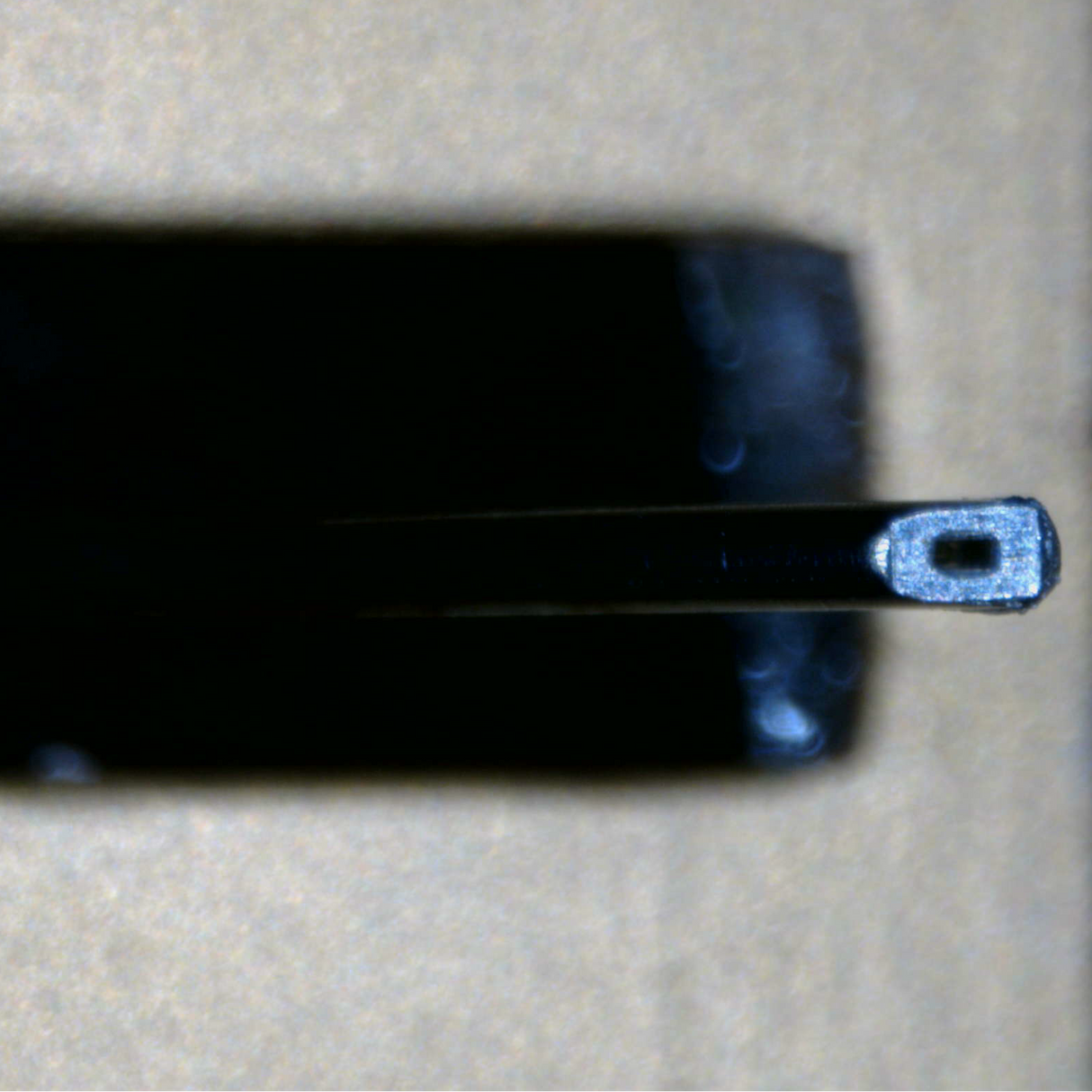 Close up of a used Koetsu Red T Moving Coil Cartridge showing sylus