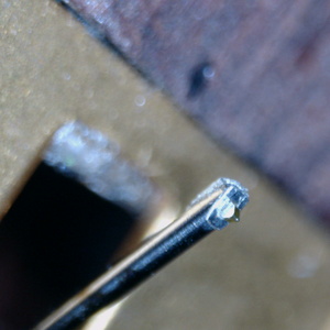 Close up of a used Koetsu Red T Moving Coil Cartridge showing sylus