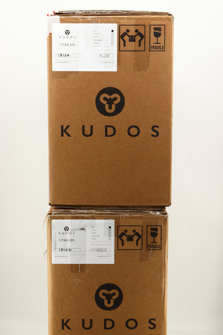 Boxes of a used pair of Kudos Titan 505 Standmount Speakers in Oak finish