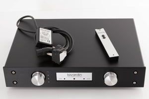 Top of a used Lavardin ISX Integrated Amplifier W/ Remote in a Black finish showing Mains Cable and Remote