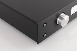 Front left corner of a used Lavardin ISX Integrated Amplifier W/ Remote in a Black finish