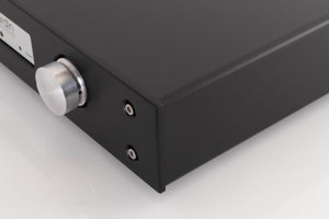 Front right corner of a used Lavardin ISX Integrated Amplifier W/ Remote in a Black finish