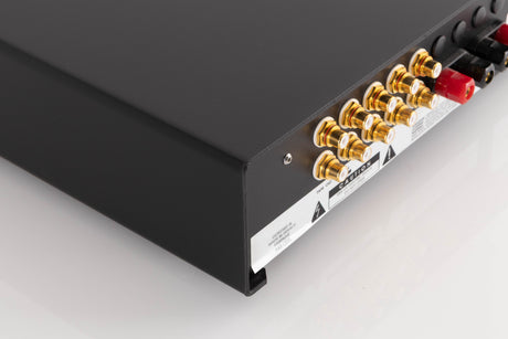 Rear right corner of a used Lavardin ISX Integrated Amplifier W/ Remote in a Black finish