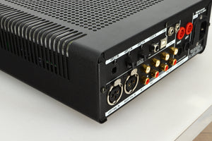 View of the back left corner of a used Leema Acoustics Elements Integrated Amplifier in silver finish 