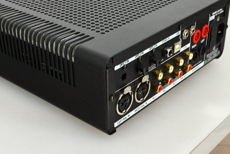 View of the back left corner of a used Leema Acoustics Elements Integrated Amplifier in silver finish 