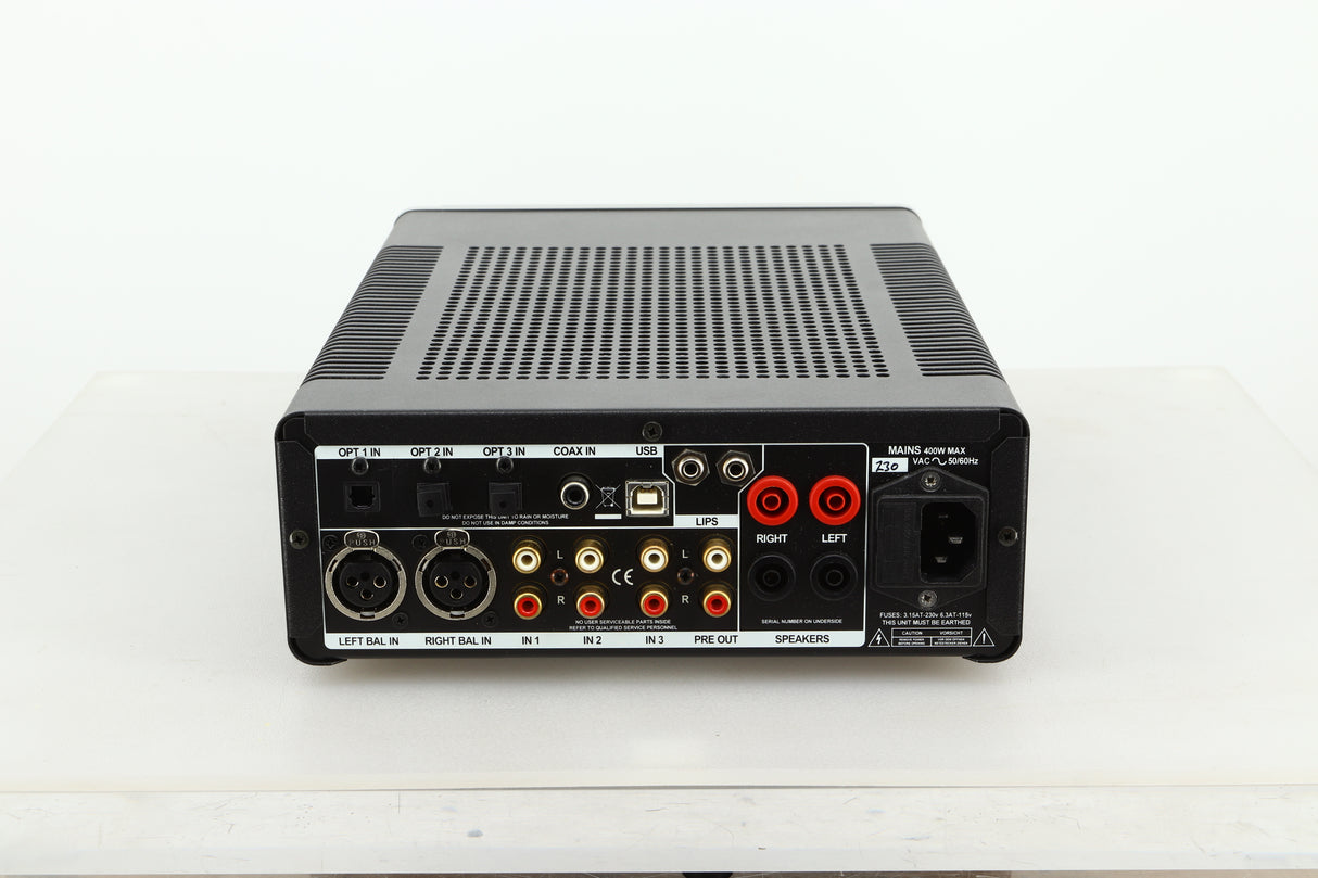 Rear view of a used Leema Acoustics Elements Integrated Amplifier in silver finish showing optical, balanced XLR, RCA, and mains inputs, and speaker outputs
