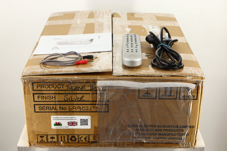 Box of a used Leema Tucana II Integrated Amplifier in Silver finish with Mains cable, manual, remote, and 3.5mm Cable 