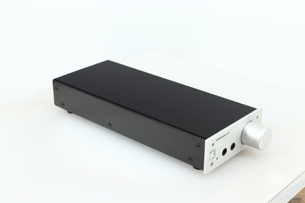 Front left corner of a used Lehmann Black Cube Linear Headphone Amplifier in a silver finish
