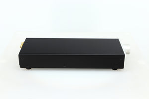 Left side view of a used Lehmann Black Cube Linear Headphone Amplifier in a silver finish