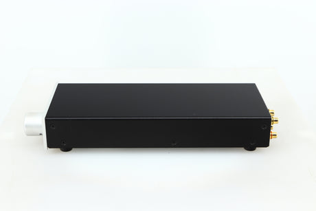Right side view of a used Lehmann Black Cube Linear Headphone Amplifier in a silver finish