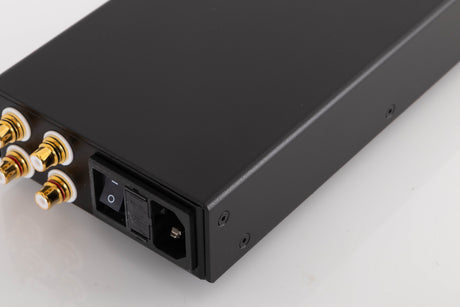 Rear left corner of a used Lehmann Linear Headphone Amplifier in a Black finish