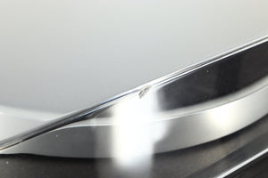 Close up of a used Linn Basik Turntable / Akito Tonearm in a black finish showing a chip on the front edge lid