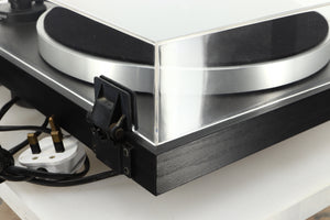 Rear left corner of a used Linn Basik Turntable / Akito Tonearm in a black finish