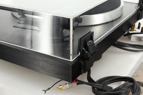 Rear right corner of a used Linn Basik Turntable / Akito Tonearm in a black finish