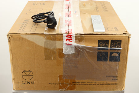 Box of a used Linn Klimax Exakt DSM System Hub showing mains cable, and remote