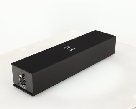 Front left corner of a used Linn Lingo 4 Turntable Power Supply in a black finish