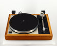 Front view of a used Linn LP12 Akurate Turntable / Ekos SE Tonearm / Krystal Cartridge in a walnut finish