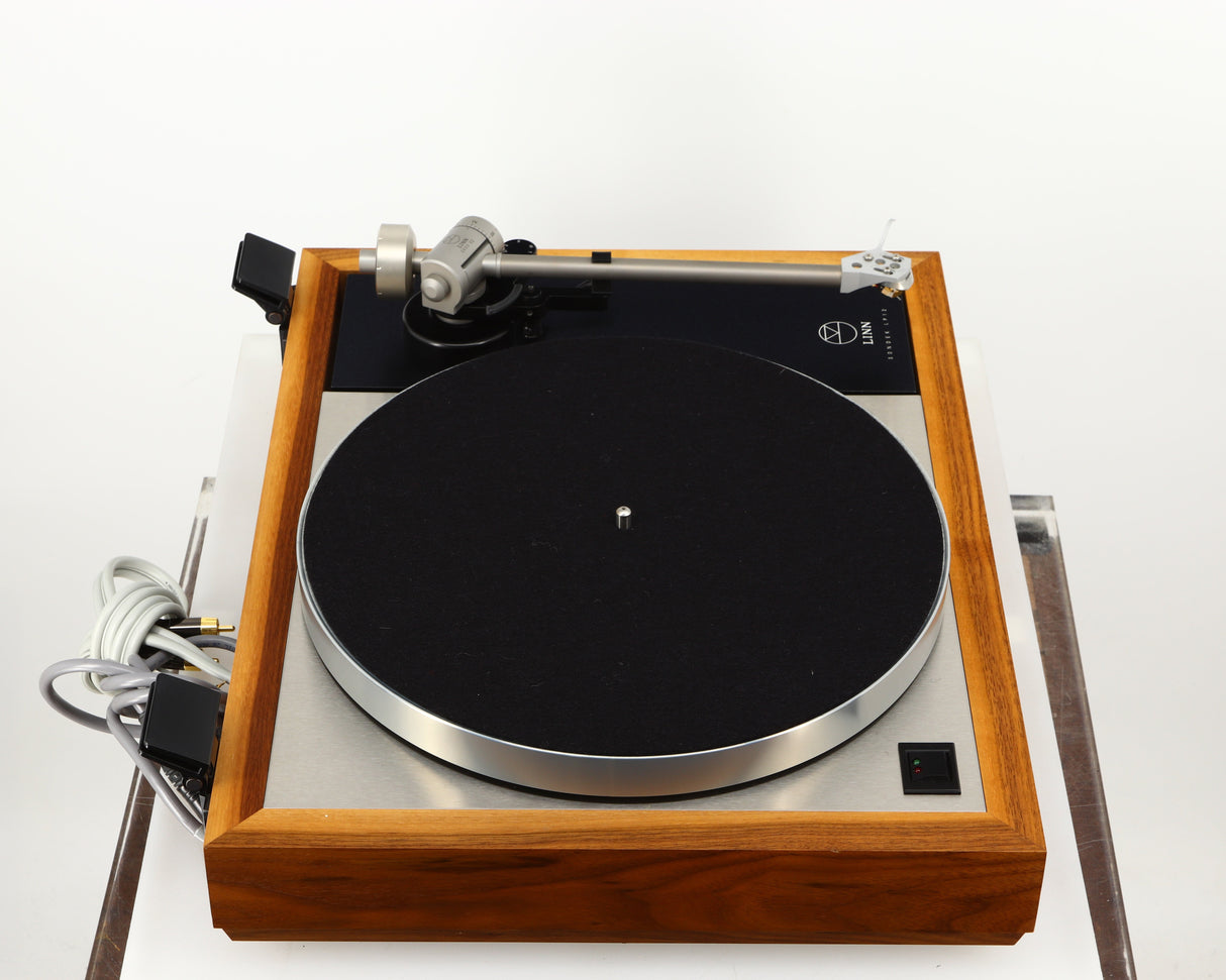 Left side view of a used Linn LP12 Akurate Turntable / Ekos SE Tonearm / Krystal Cartridge in a walnut finish