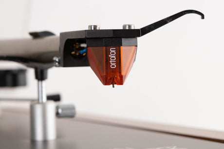 Close up view of a Linn LP12 Turntable in Afromosia with Ittok LVII Tonearm and Ortofon 2M Bronze Cartridge
