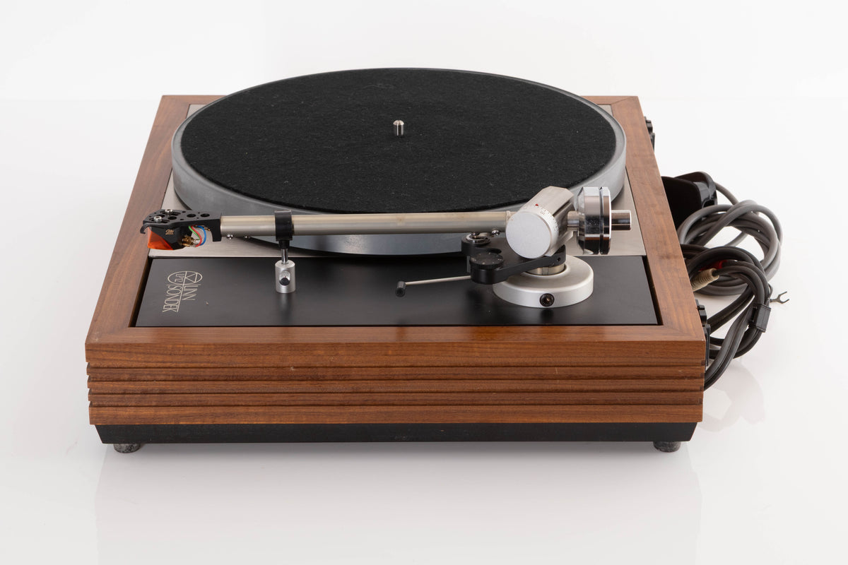 Side view of a Linn LP12 Turntable in Afromosia with Ittok LVII Tonearm and Ortofon 2M Bronze Cartridge