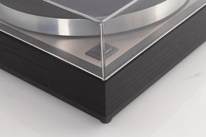 Front left corner of a used Linn LP12 Turntable / Basik Plus Tonearm / K-9 Cartridge in a Black Ash finish