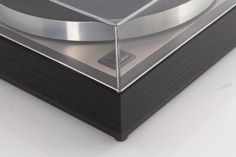 Front left corner of a used Linn LP12 Turntable / Basik Plus Tonearm / K-9 Cartridge in a Black Ash finish