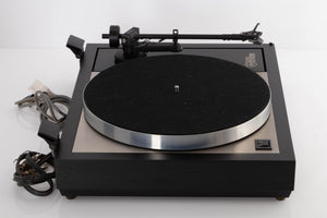 Left side view of a used Linn LP12 Turntable / Basik Plus Tonearm / K-9 Cartridge in a Black Ash finish